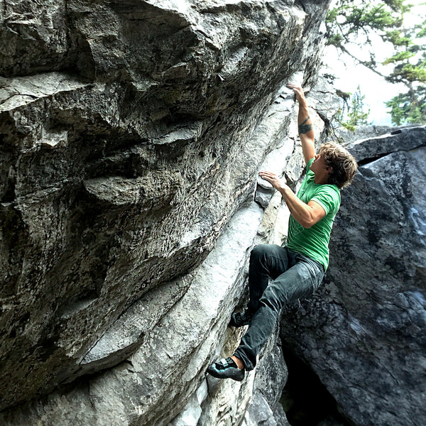 Alex bouldering in Kelowna while modelling the IMClimbing  boulder design